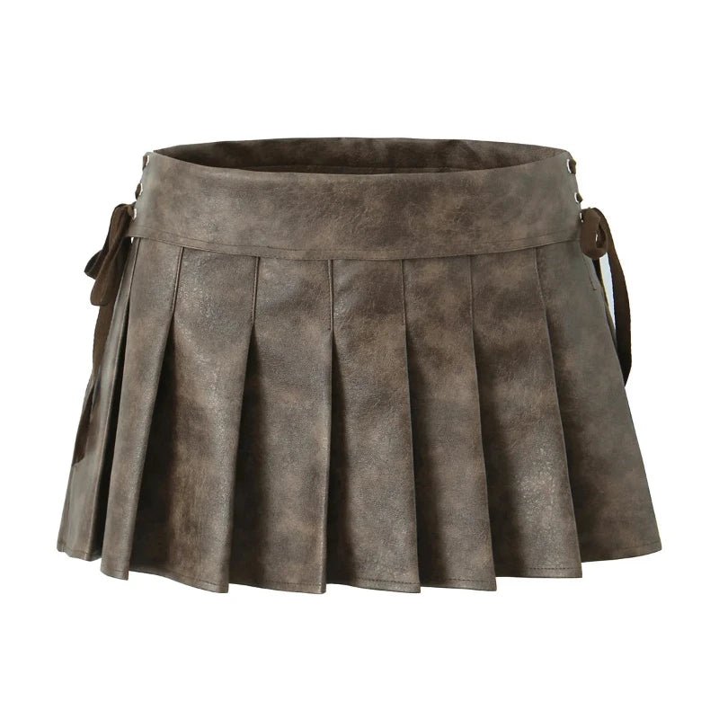 Low Waist Eyelet PU Leather Pleated Mini Skirt - SHExFAB